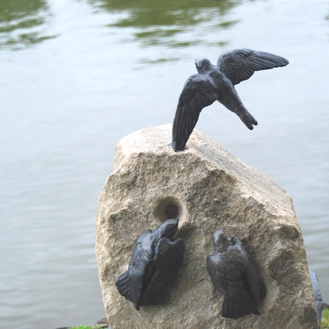 Bronze Sand Martins on Worked Stone by JOEL