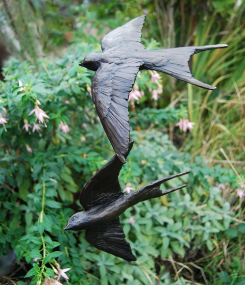 Bronze Swallow Fuscia garden by Sculptress JOEL