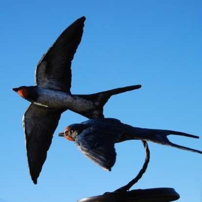 Bronze Swallow Pair on Bronze stand by JOEL