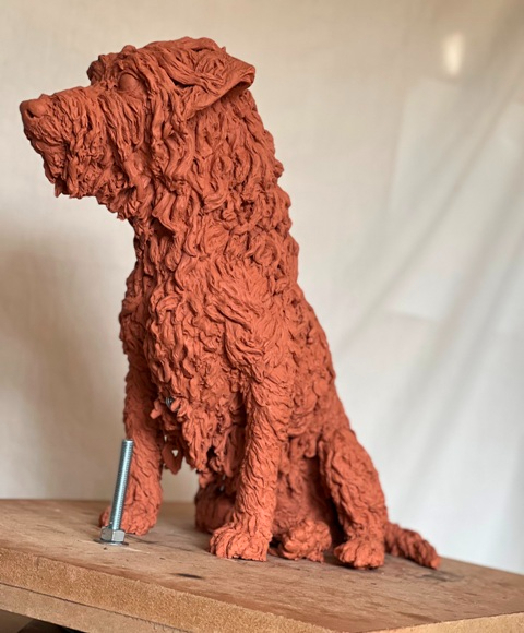 Milo dog statue in Clay the development of Mane 1