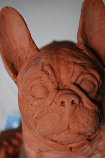 Precious Dog  close up of head in clay by JOEL