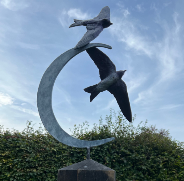 Purple Martin bird sculpture by Sculptress Joel