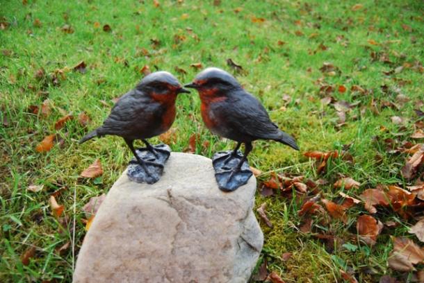 Robin Bronzes  on stone base by JOEL