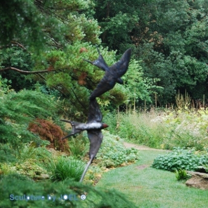 Swallow Brone pair by JOEL a garden statue