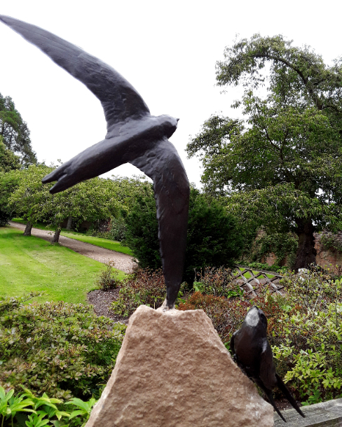 Swift Home Sculpture by JOEL in garden