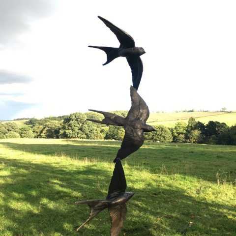 Three Swallow Flight against cloudy Sky by JOEL