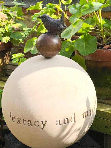 Wren extacy and mirth bronze and stone by JOEL